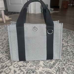 lululemon athletica Black and White canvas mini bag.